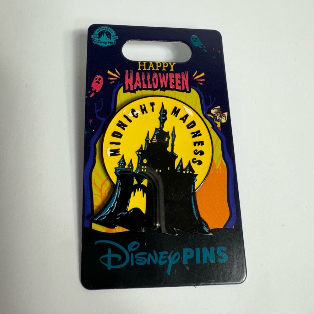 NWT. Disney glow in the dark castle pin. The traditional Disney storybook castle